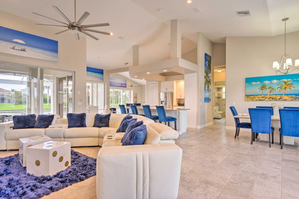 Staged living room with neutral colors and natural light in Cape Coral home